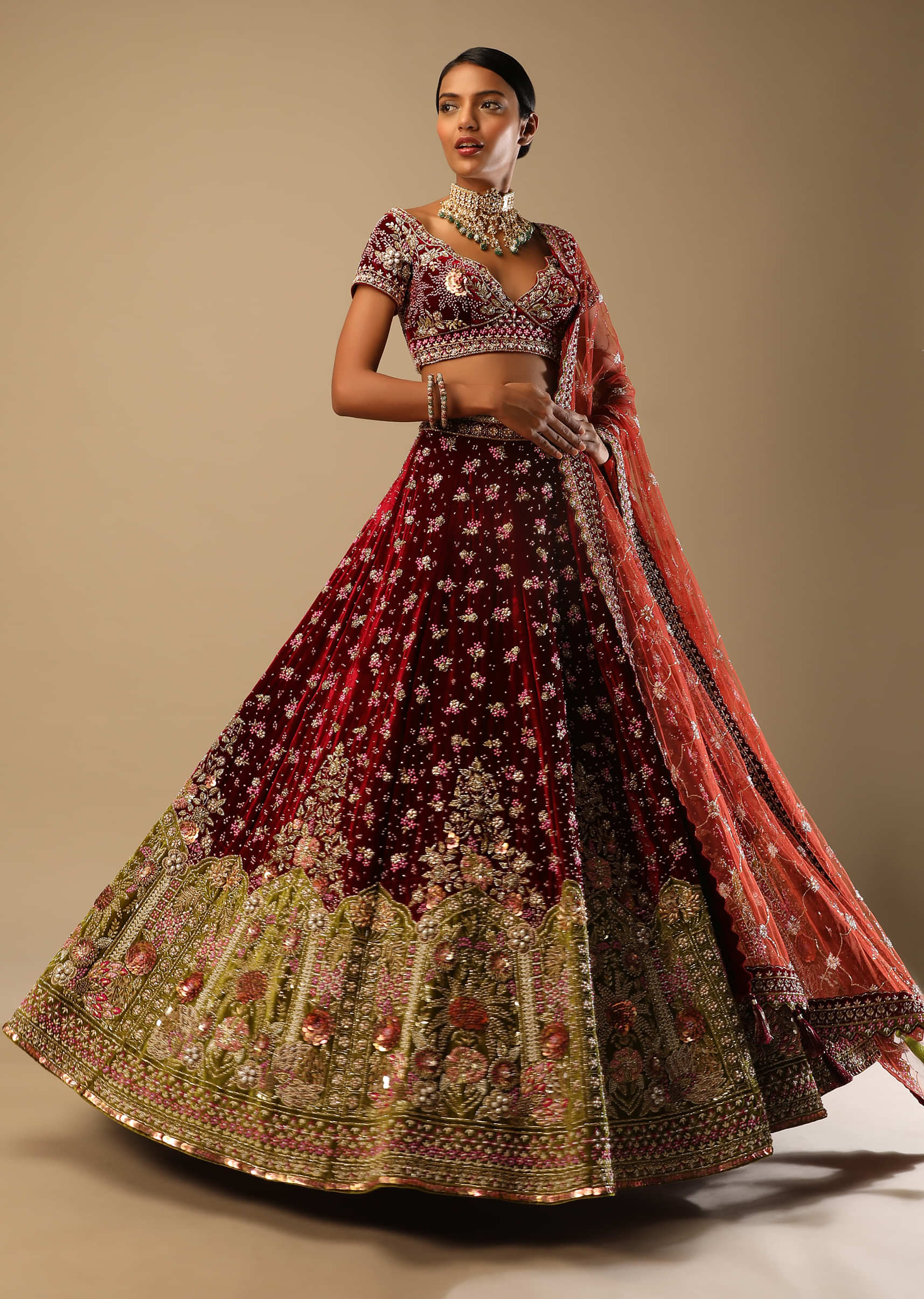 Persian Red Lehenga Choli In Velvet With Moss Green Mughal Border And Multi Colored Hand Embroidered Flowers 