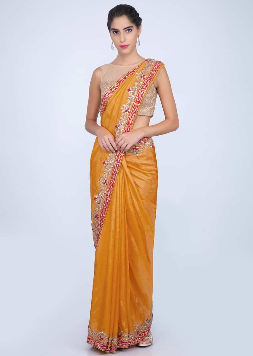 Pine yellow dupion silk saree with gotta embroidered border only on kalki