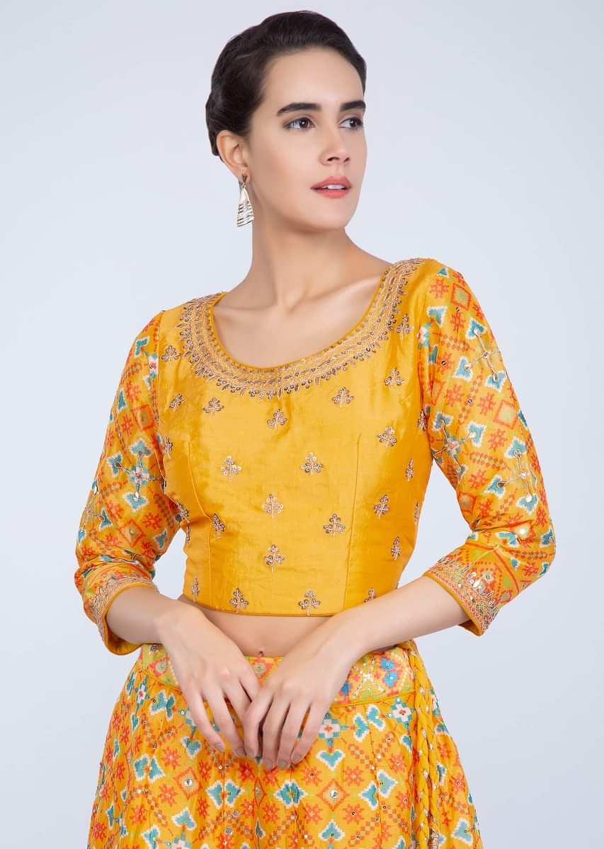 Pine Yellow Lehenga With Patola Print And Contrasting Punch Pink Weaved Dupatta Online - Kalki Fashion
