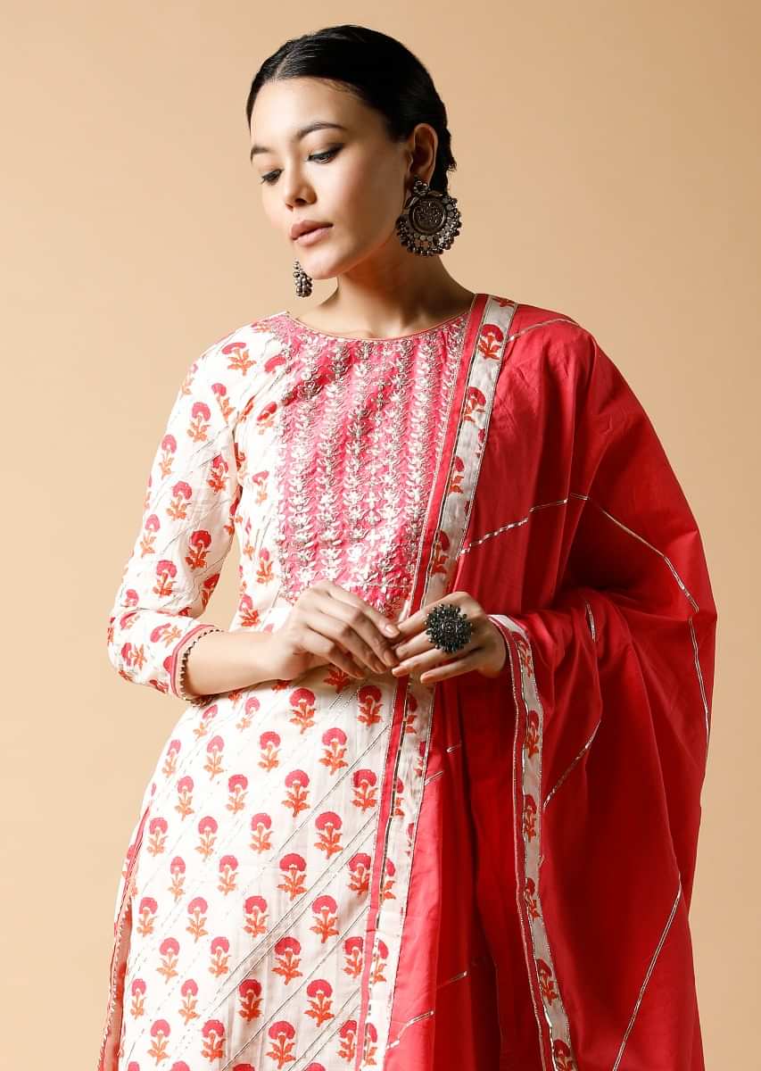 Pink And White Sharara Suit With Printed Floral Buttis And Detailed Using Zari And Gotta Lace 