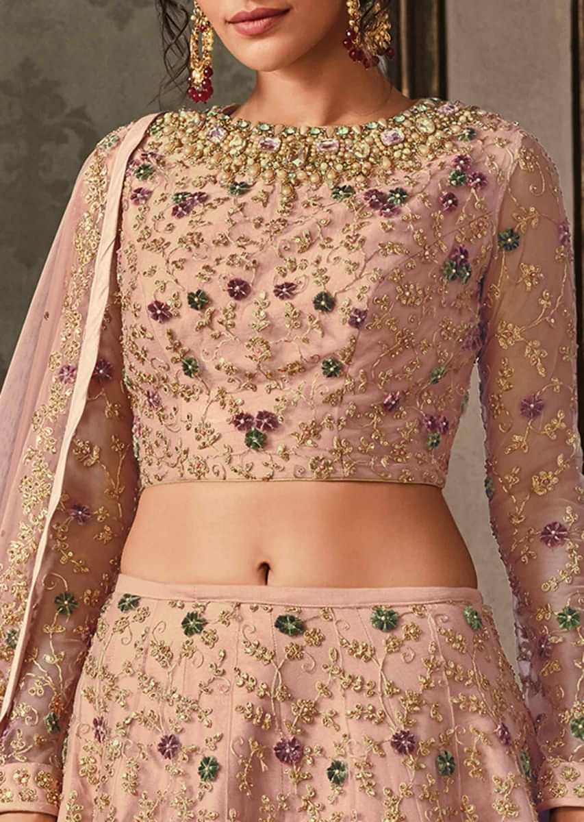 Pink lehenga set featuring in net with stone embroidered neckline