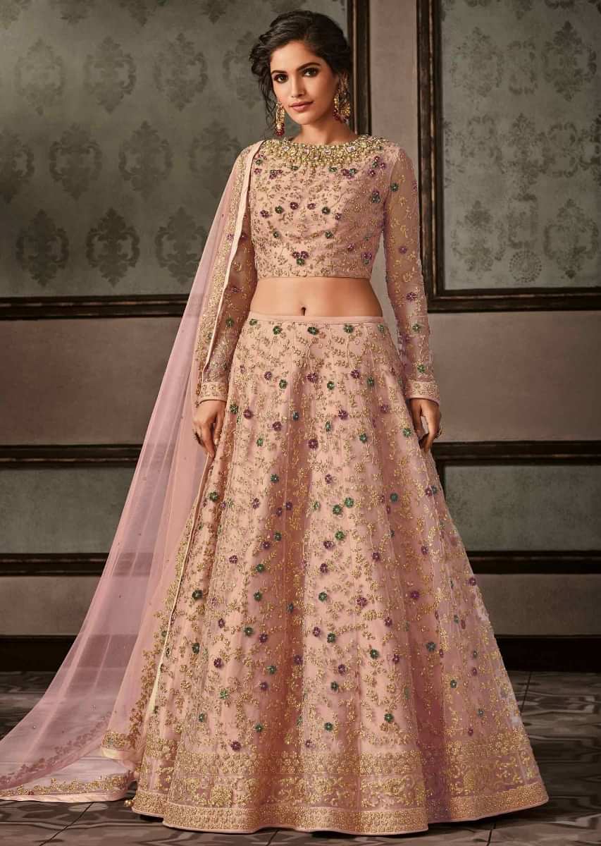 Pink lehenga set featuring in net with stone embroidered neckline
