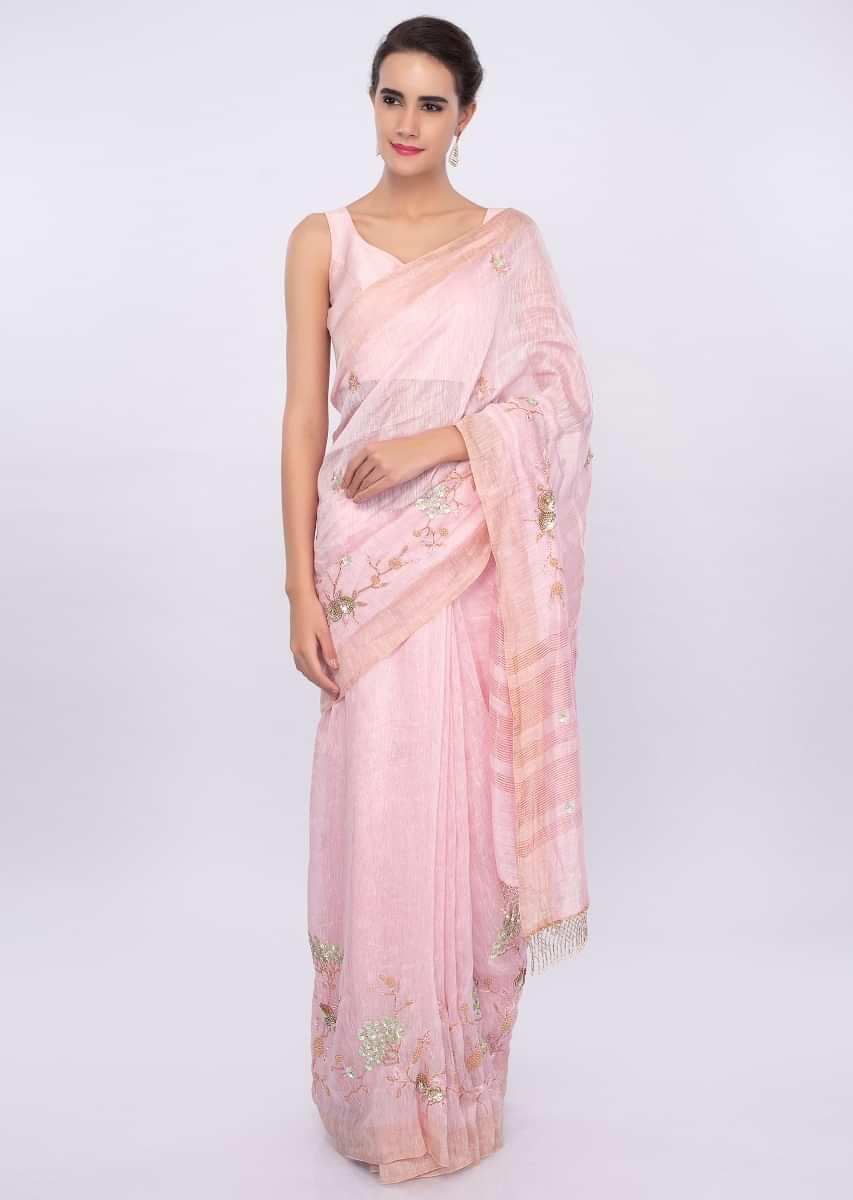 Pink linen saree with self thread , sequins and cut dana embroidery only on Kalki