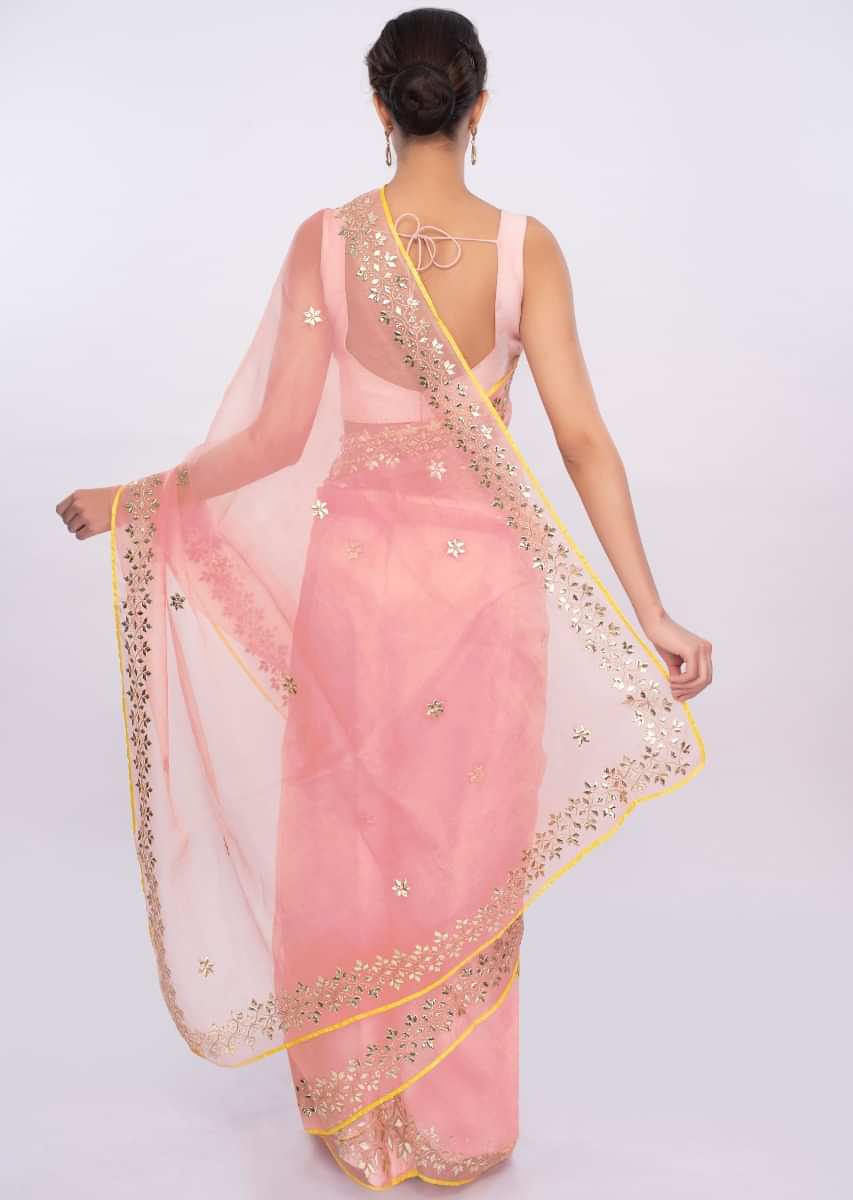 Pink organza saree with embroidery and butti only on kalki