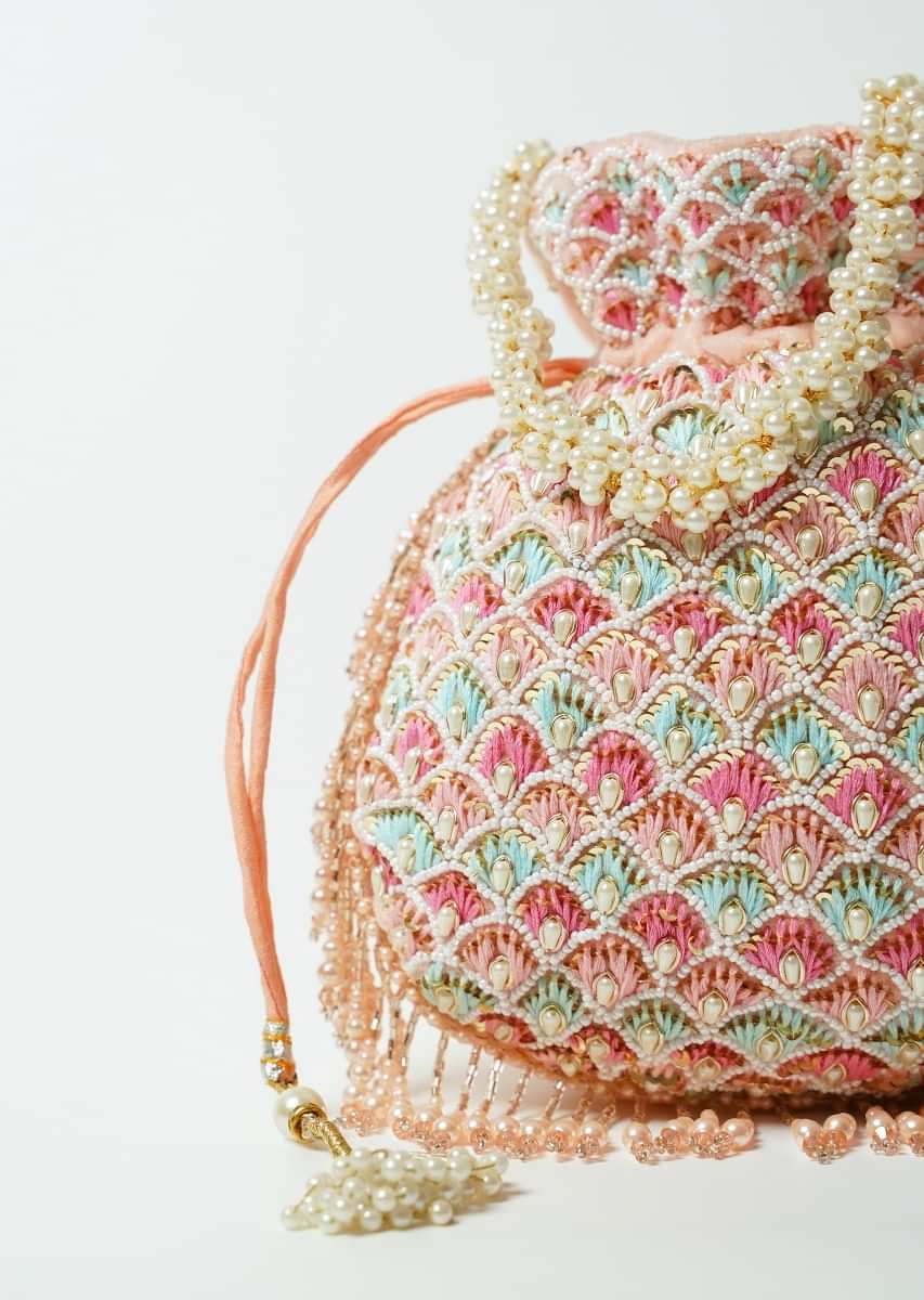Peach Potli Bag In Velvet Adorned With Multicolored Thread And Beads Embroidered Scallop