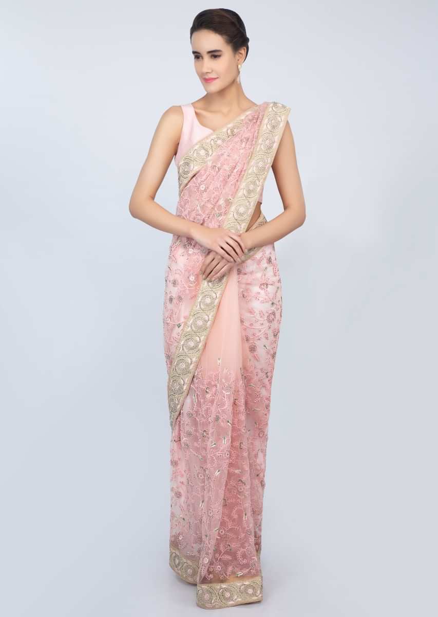 Pink sheer net saree jaal embroidered  saree with contrasting beige raw silk blouse only on kalki