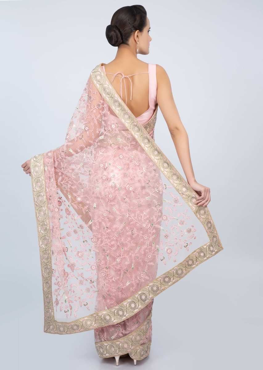 Pink sheer net saree jaal embroidered  saree with contrasting beige raw silk blouse only on kalki
