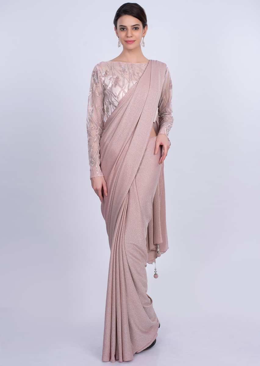 Pink shimmer lycra saree with matching embroidered blouse only on Kalki