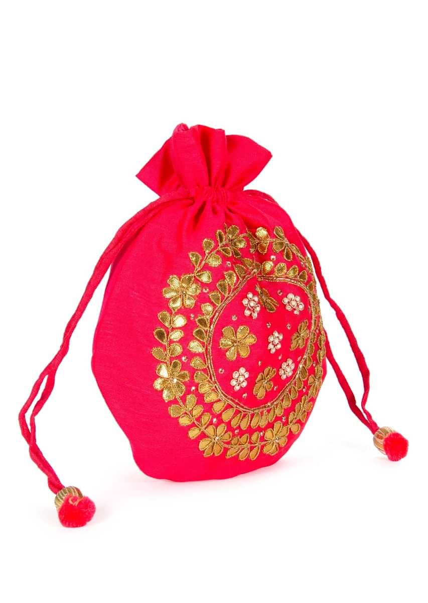 Pink velvet potli bag embellished in gotta patch and moti kalki