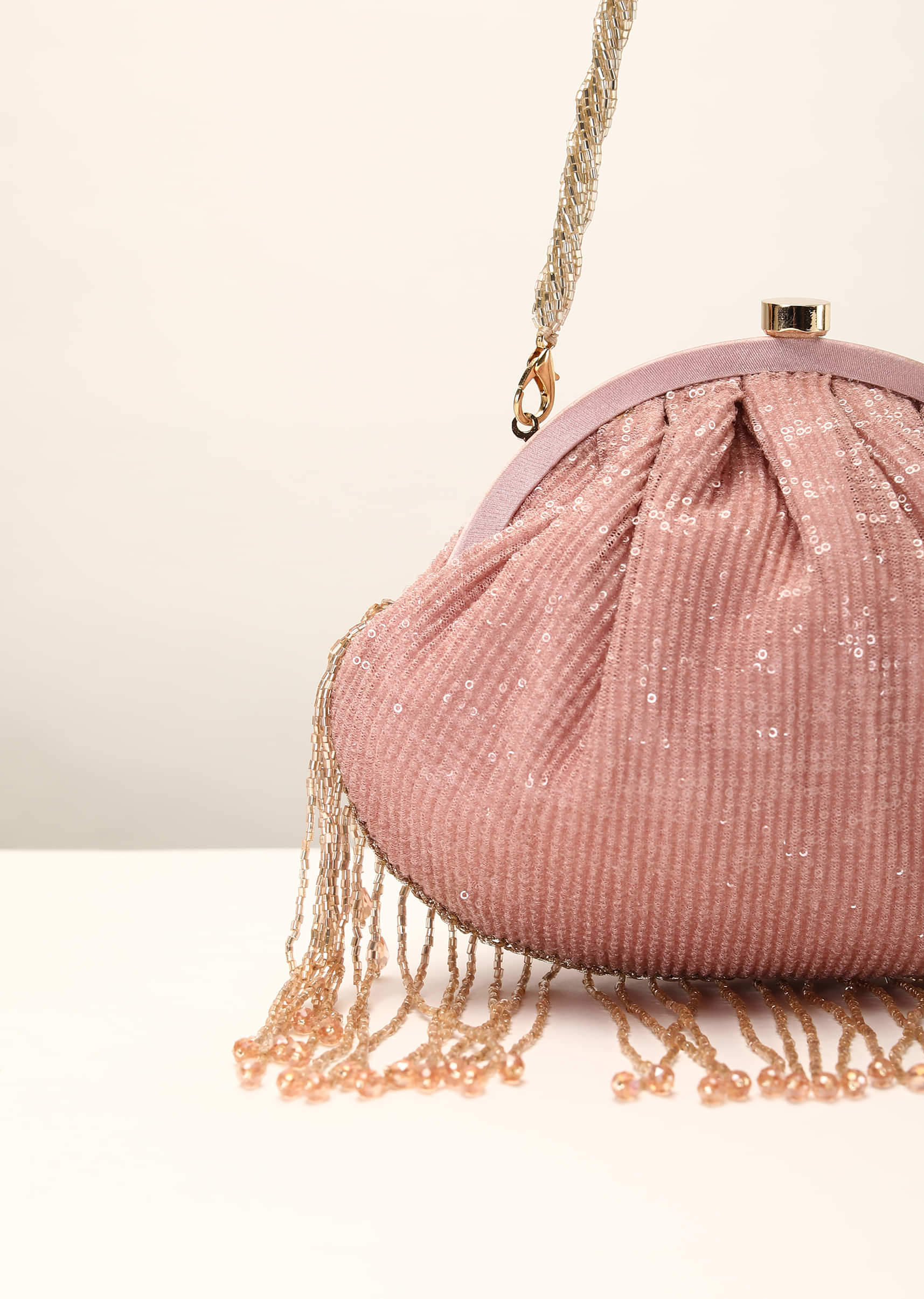 Pink Clutch In Crushed Sequins Fabric With Cut Dana Fringes On The Edges