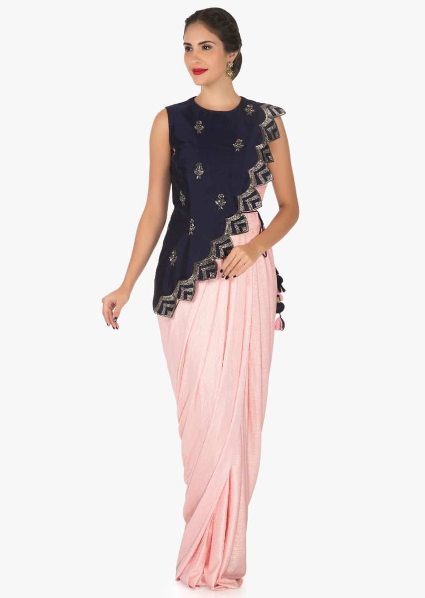 Pink dress in lycra with a navy blue silk jacket embellished in cut dana embroidery work only on Kalki 
