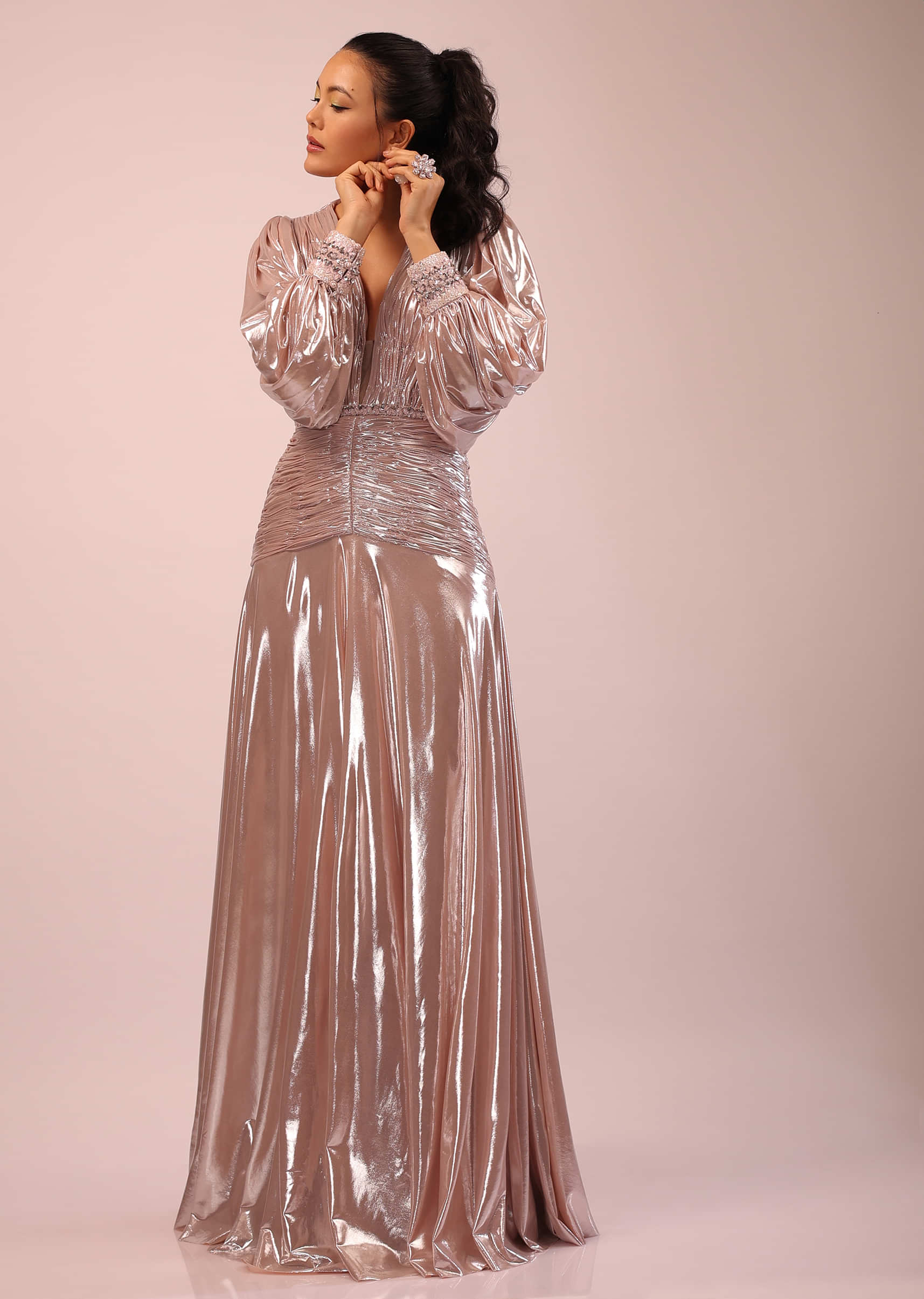 Pink Gown In Metallic Lycra With Ruching And Bishop Sleeves Detailed In Sequins Embroidery