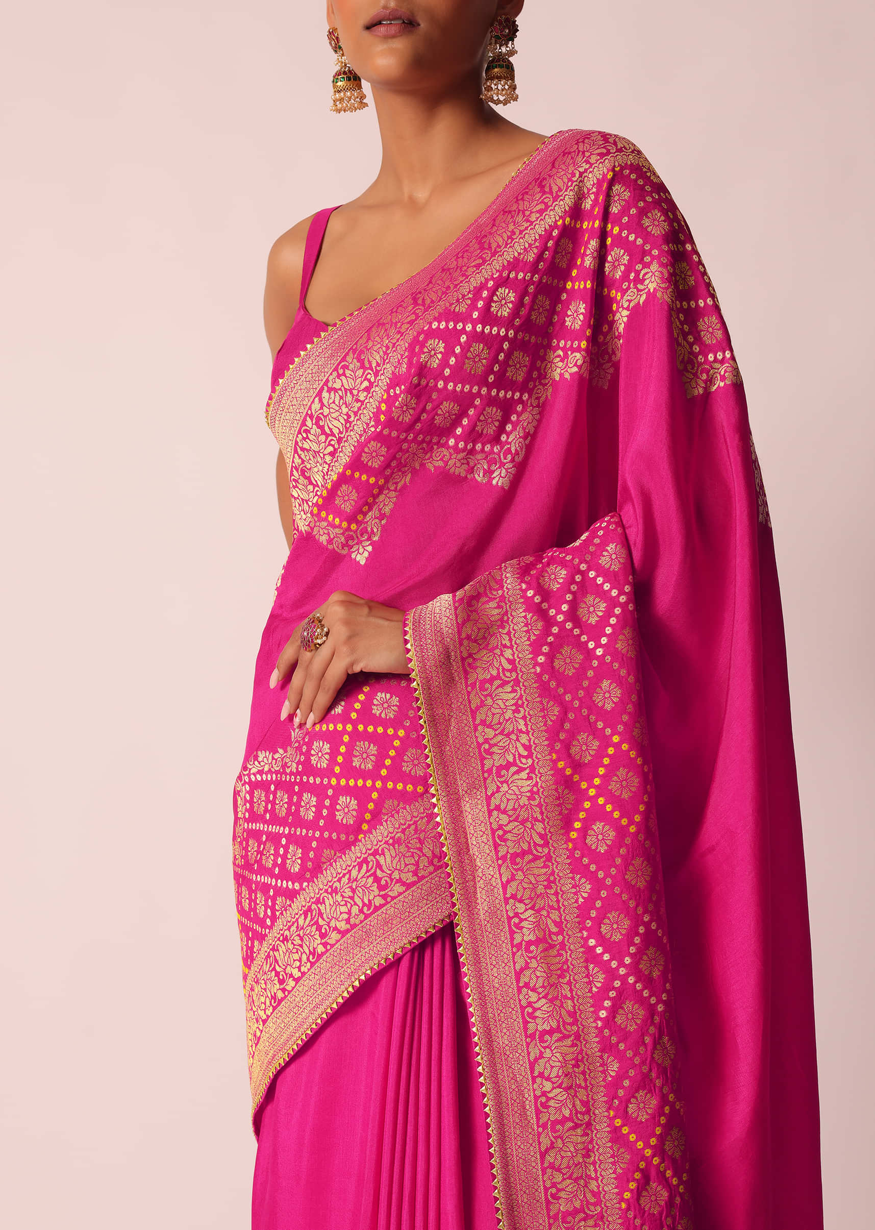 Rani Pink Woven Saree In Silk with Bandhani Detail And Unstitched Blouse  Piece