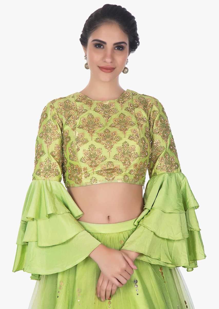 Pista green brocade crop  top in layered sleeves with satin net skirtonly