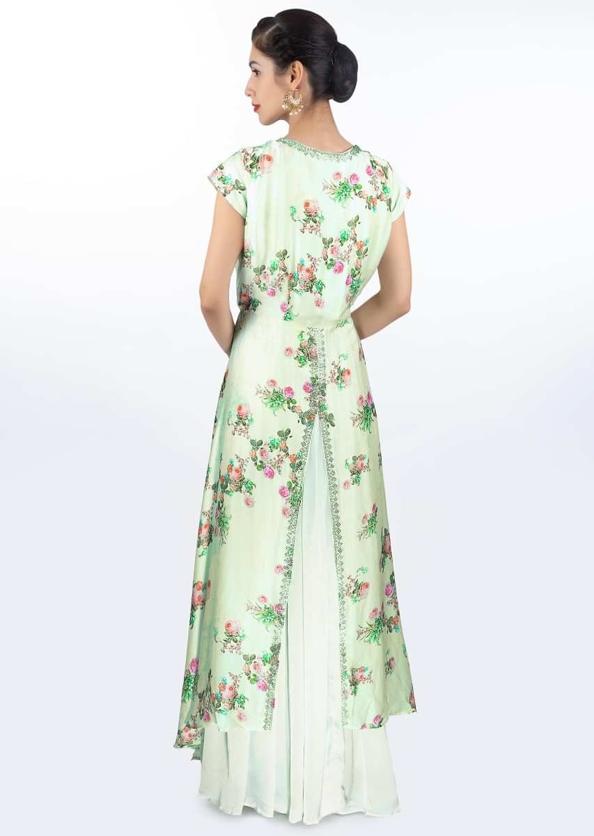 Pista green satin crepe dress in floral embroidery paired with long printed jacket