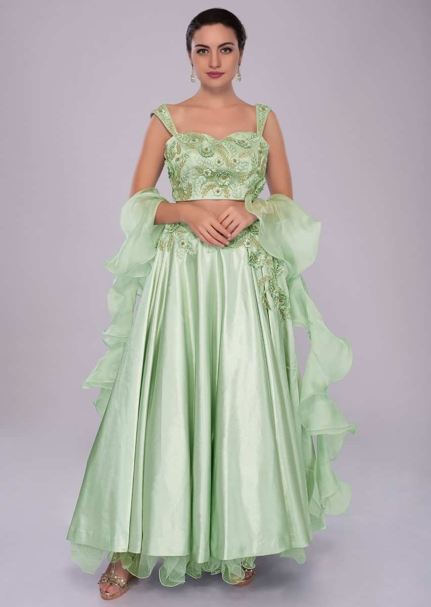 Pista green satin crepe lehenga and embroidered crop top with organza ruffled dupatta