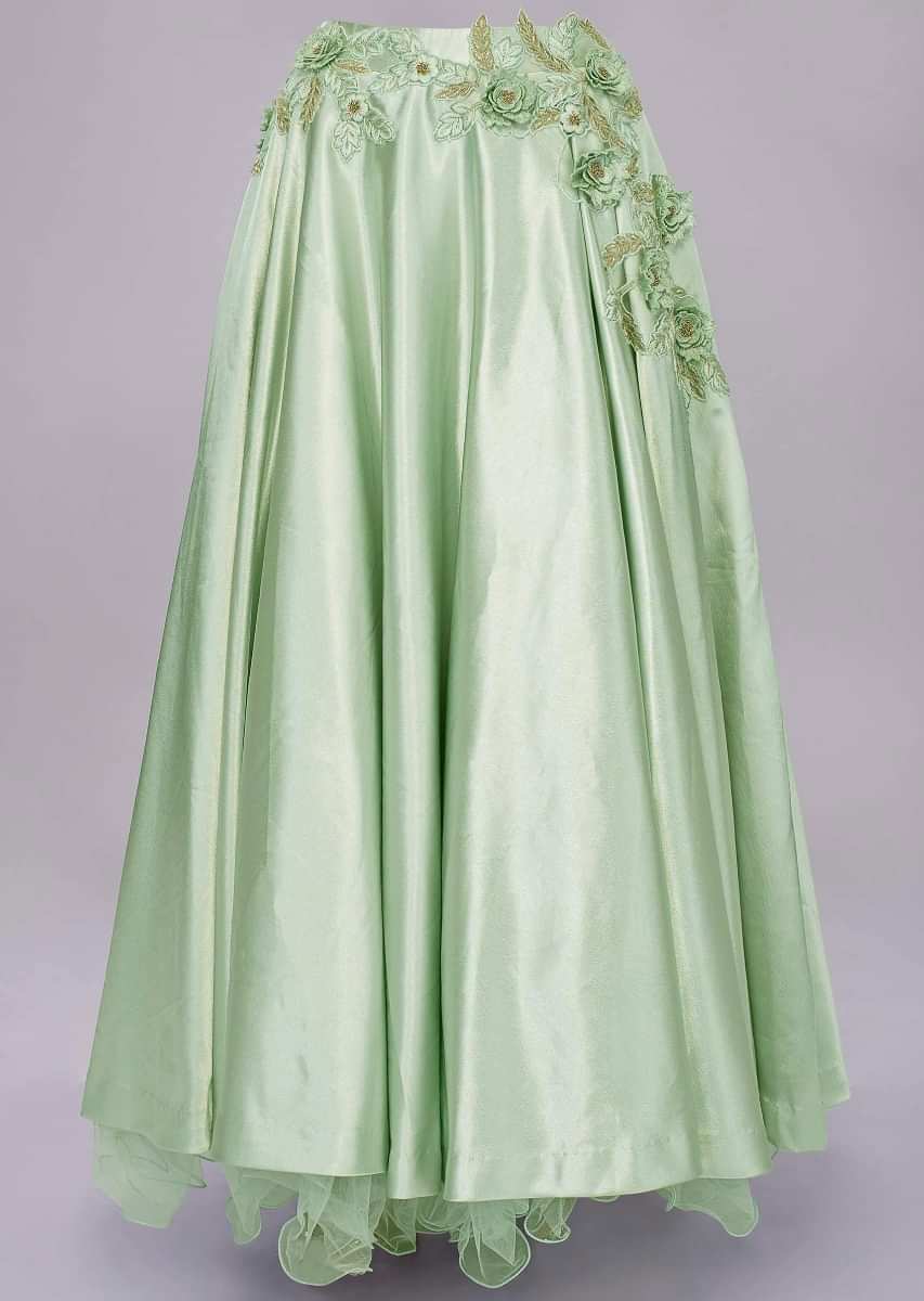 Pista green satin crepe lehenga and embroidered crop top with organza ruffled dupatta