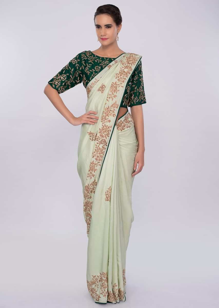 Pista green satin saree with emerald green silk blouse with cut dana embroidery only on kalki