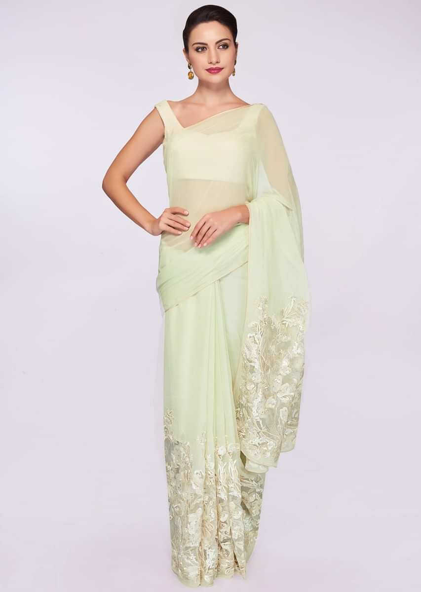 Pista green shaded georgette saree with net embroidered bottom 