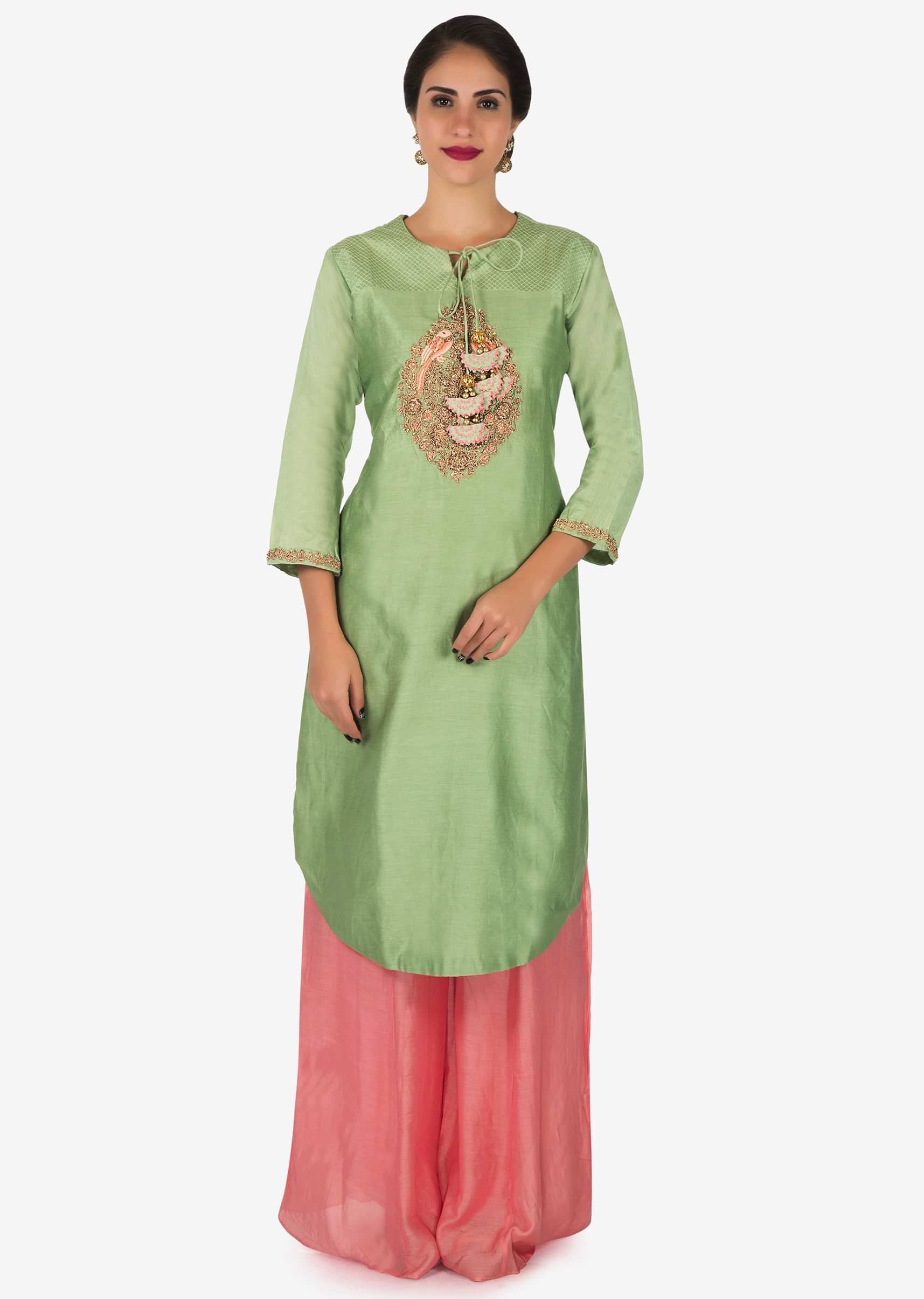Pista green  and pink palazzo suit beautified in zardosi embroidered work only on Kalki