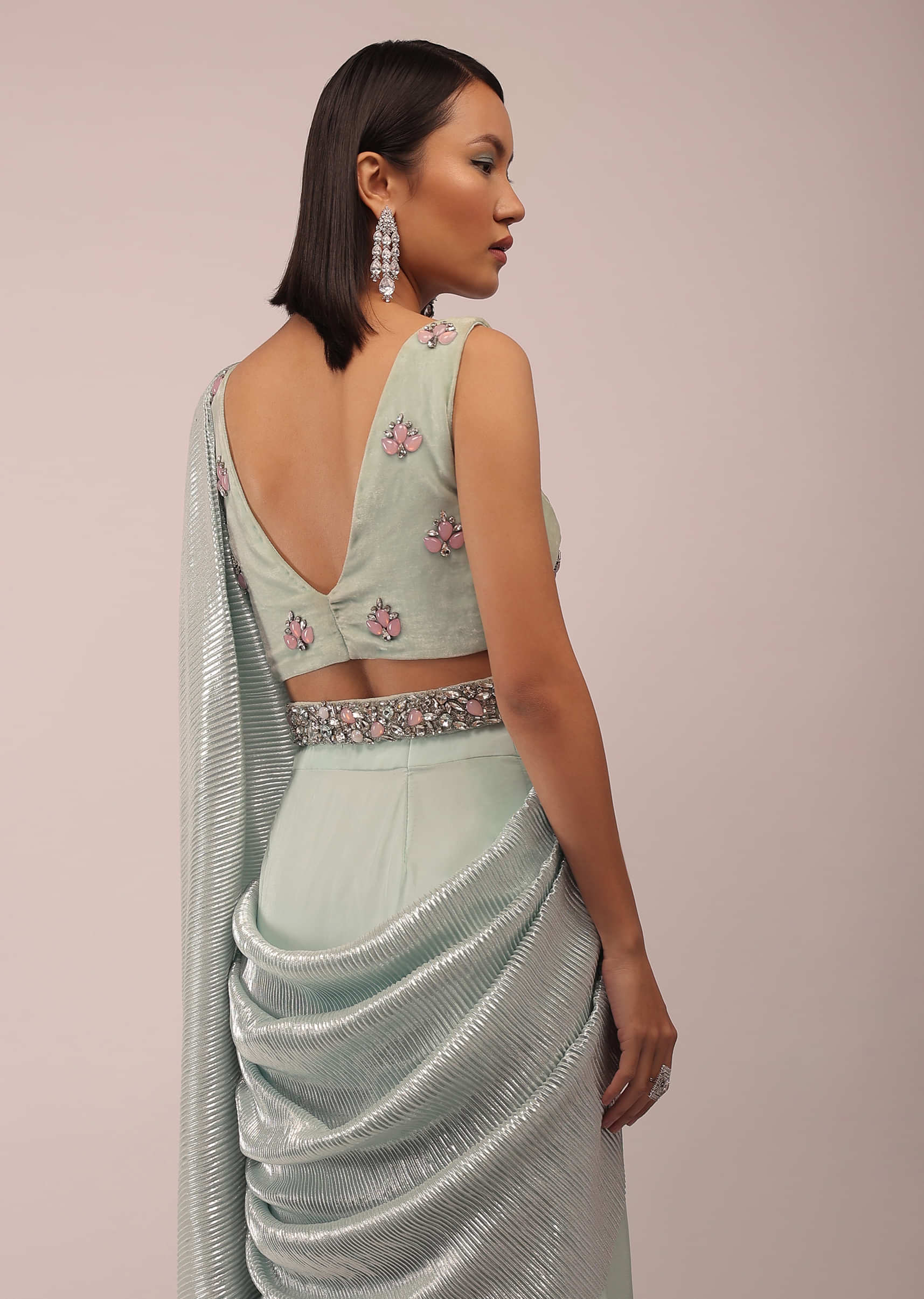 Pista Green Ready Pleated Saree With Shimmer Crepe Frill Layers And Pink Stone Studded Velvet Blouse