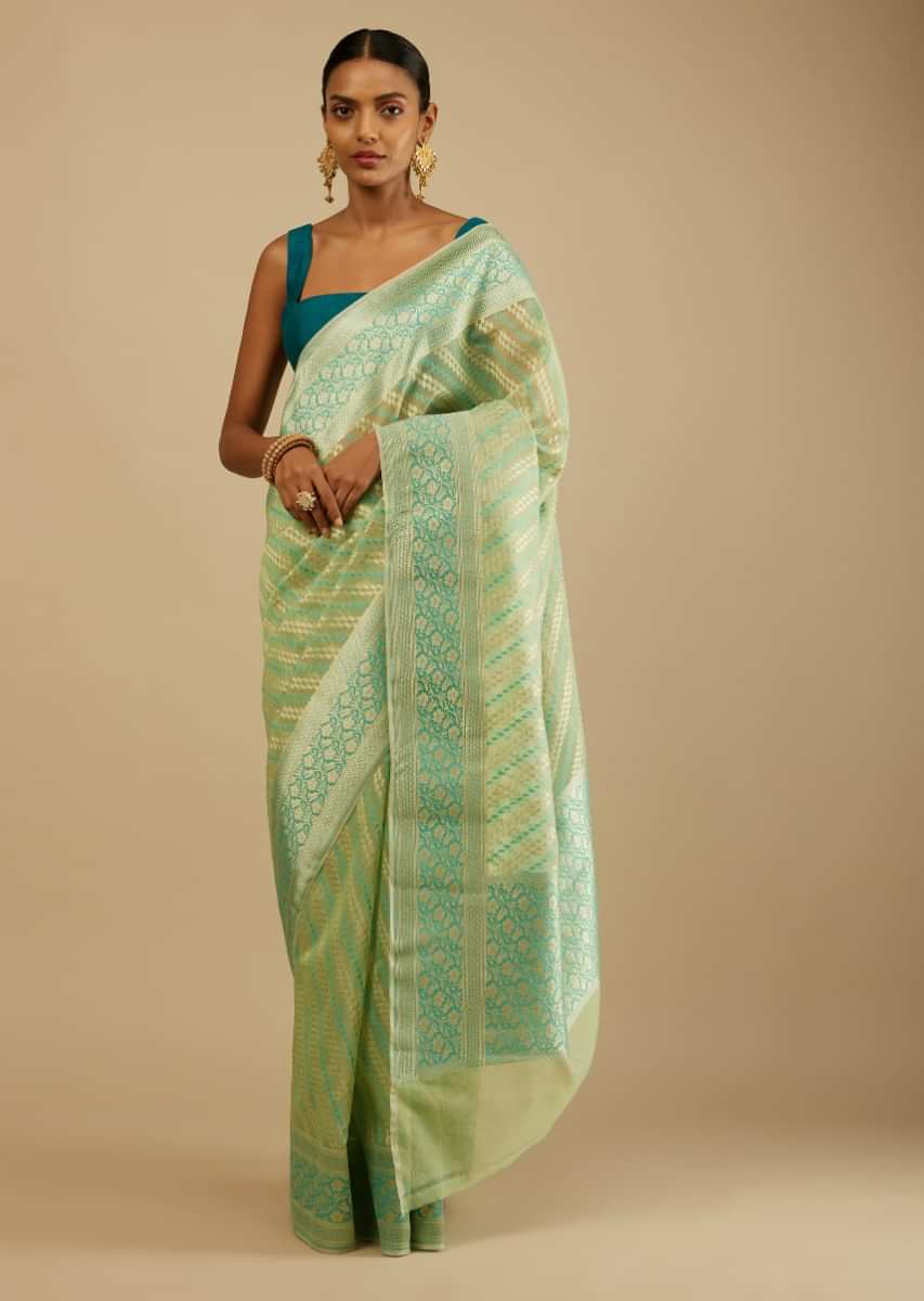 Pista Green Saree In Organza Silk With Turquoise And Gold Brocade Woven Leaf Motifs In Diagonal Striped Design And Unstitched Blouse  