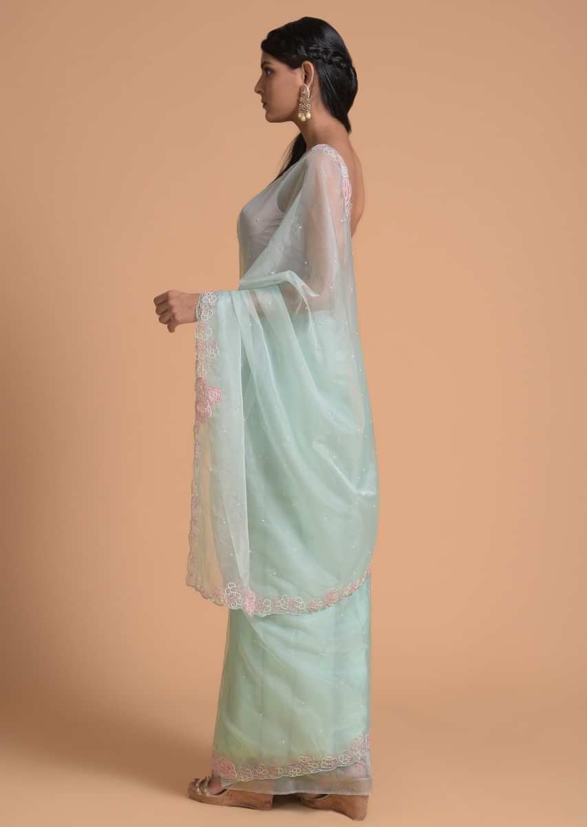 Powder Blue Saree In Organza With Applique And Moti Embroidered Floral Pattern On The Border  