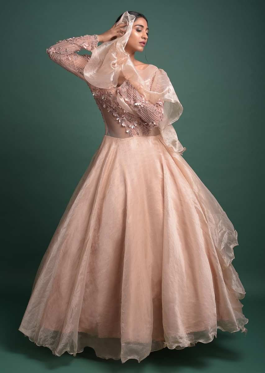 Powder Peach Gown In Shimmer Organza With Embellished Net Bodice And Attached Drape