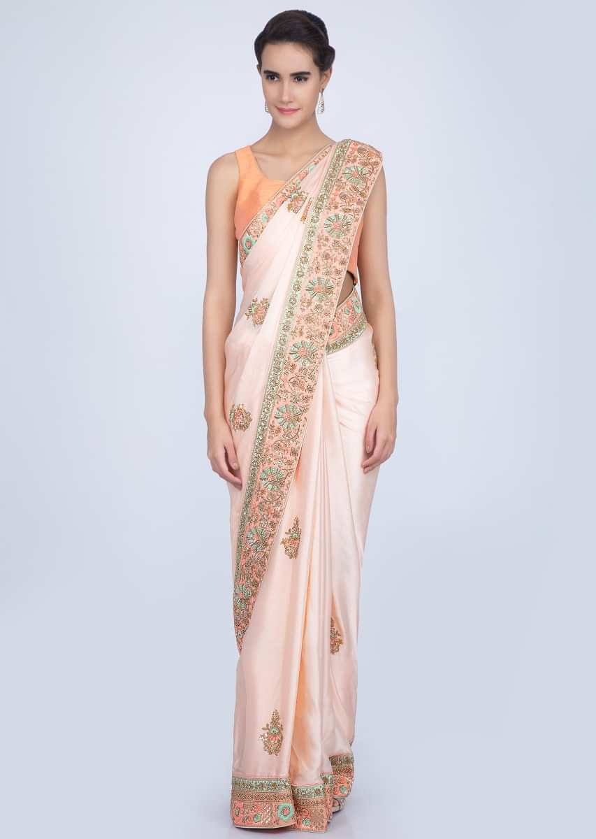 Powder Peach Saree In Satin With Butti And Heavy Embroidered Border Online - Kalki Fashion