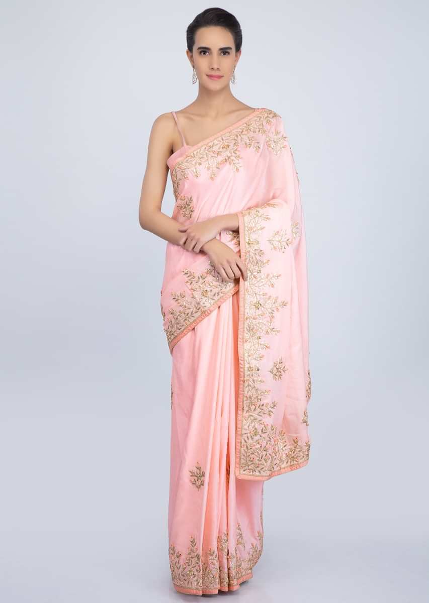 Powder pink cotton silk saree with gotta patch embroidered butti and border only on Kalki