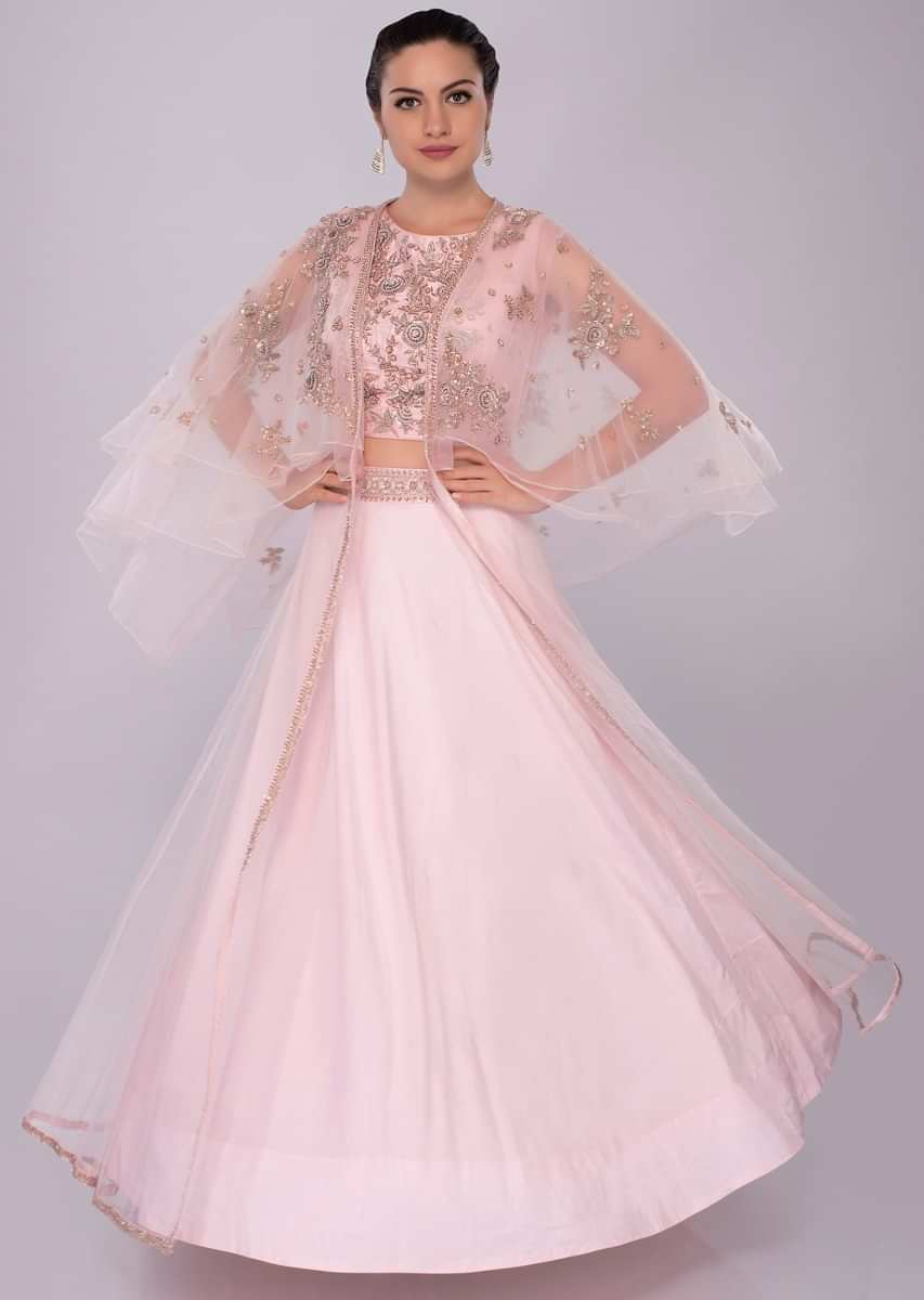 Powder pink lehenga and embroidered crop top with layered net jacket