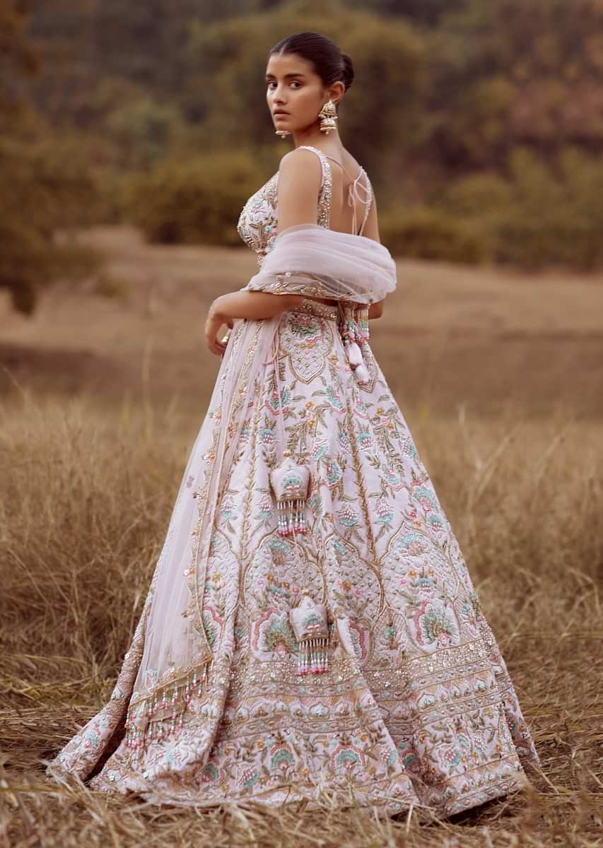 Powder Pink Lehenga Choli In Raw Silk With Colorful Resham And Cut Dana Embroidered Summertime Flowers And Mughal Motifs 