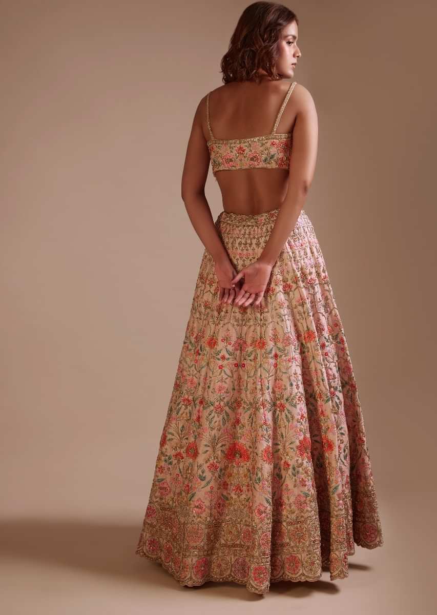 Powder Pink Lehenga Choli In Raw Silk With Multi Colored Resham And Sequins Embroidered Floral Jaal And Ethnic Motifs 