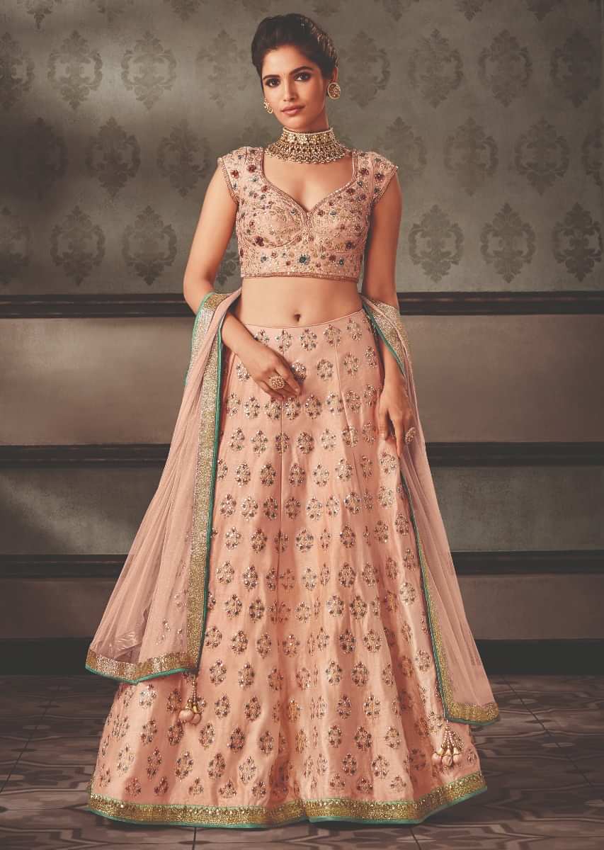 Powder pink lehenga set in silk with floral embroidered jaal and butti motif
