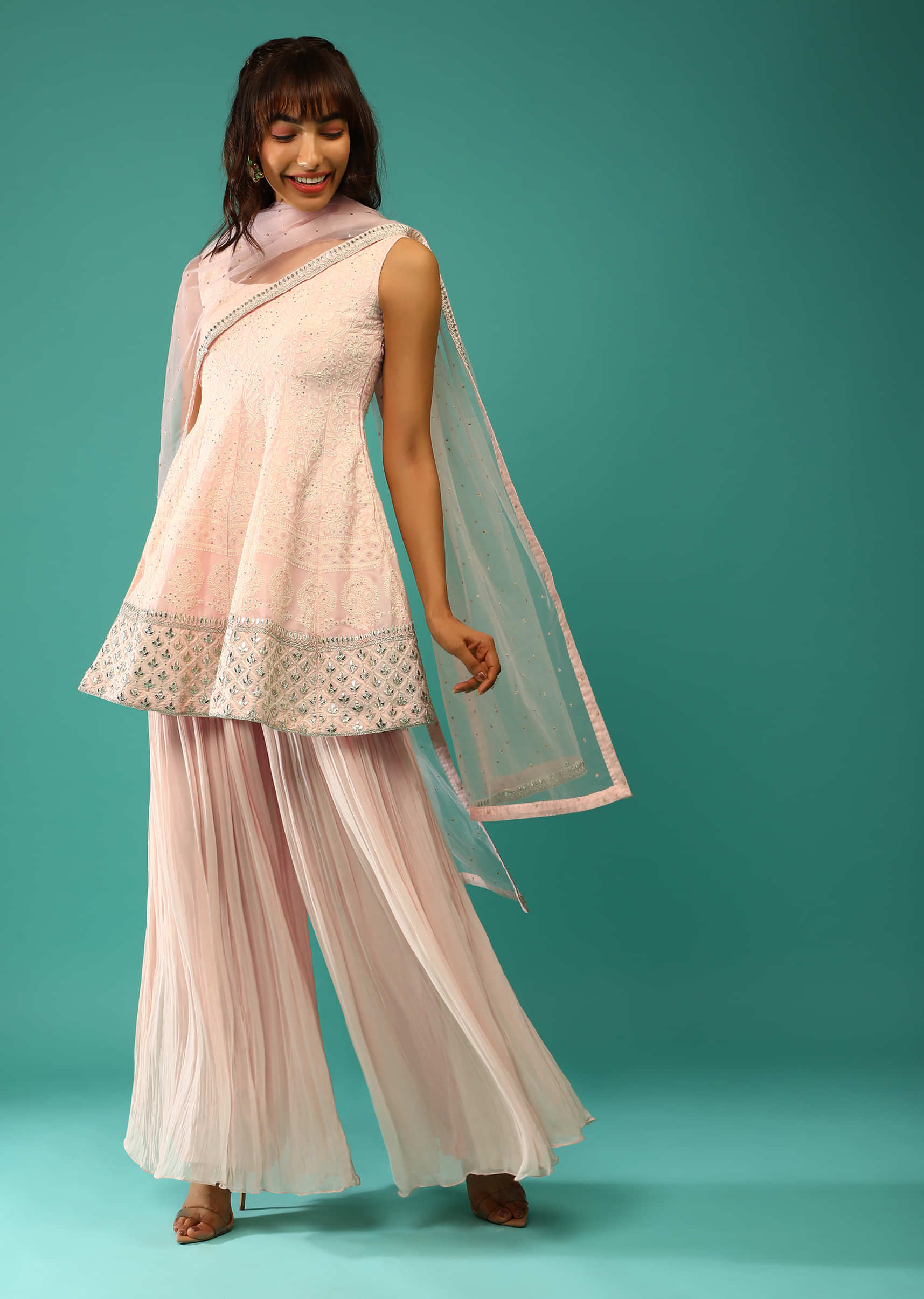 Powder Pink Palazzo Suit In Georgette With Peplum Styled Kurti Adorned In Lucknowi And Gotta Work  