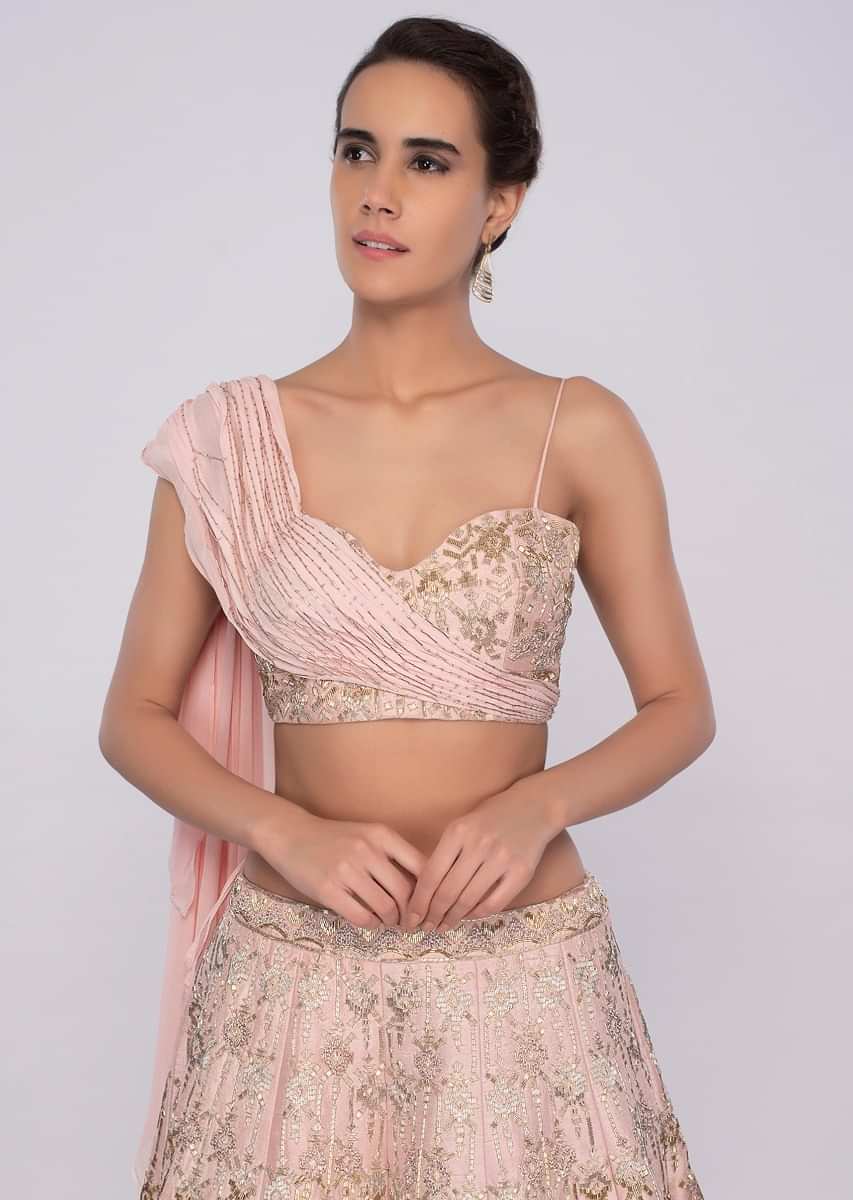 Powder Pink Lehenga In Raw Silk Teamed With One Side Strap Bustier With Georgette Drape Online - Kalki Fashion