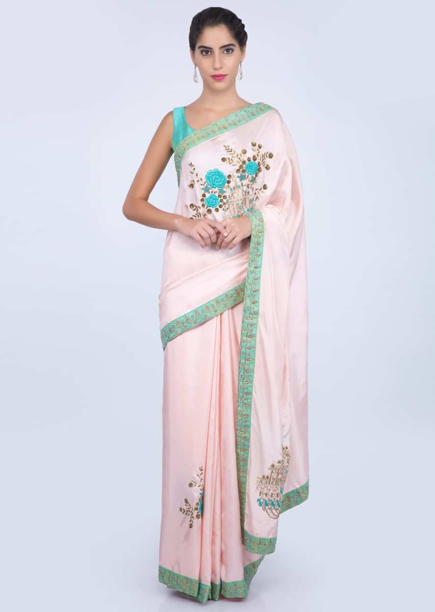 Powder pink silk saree with floral embroidered butti and border only on kalki