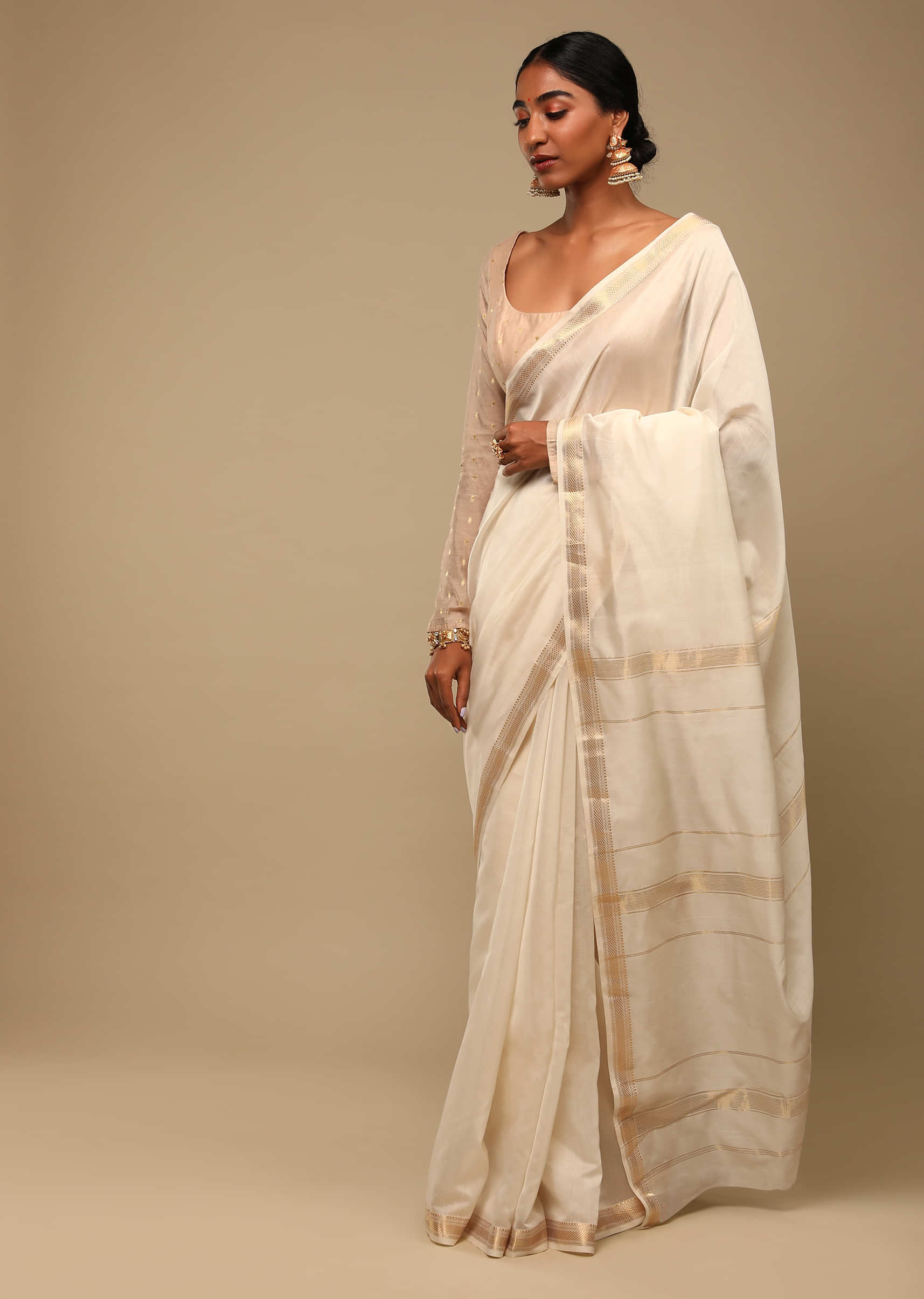 Powder White Saree In Cotton Silk With Woven Golden Stripe Detailing And Unstitched Blouse  