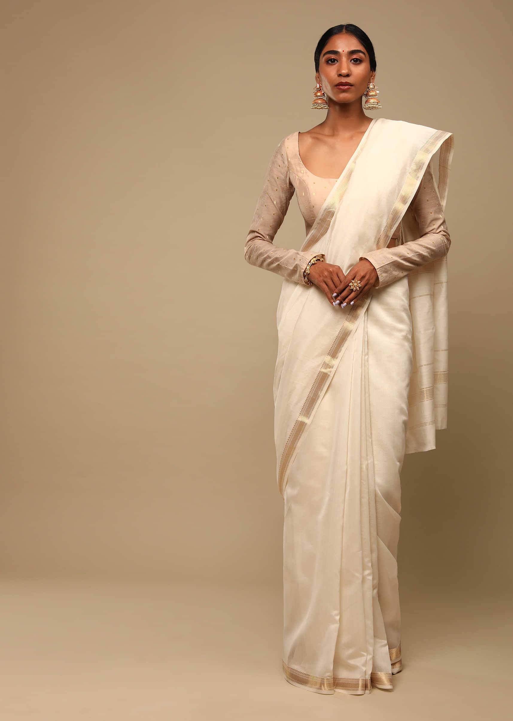 Powder White Saree In Cotton Silk With Woven Golden Stripe Detailing And Unstitched Blouse  