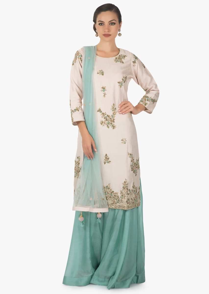 Powder pink straight suit in silk with embroidered butti and hem