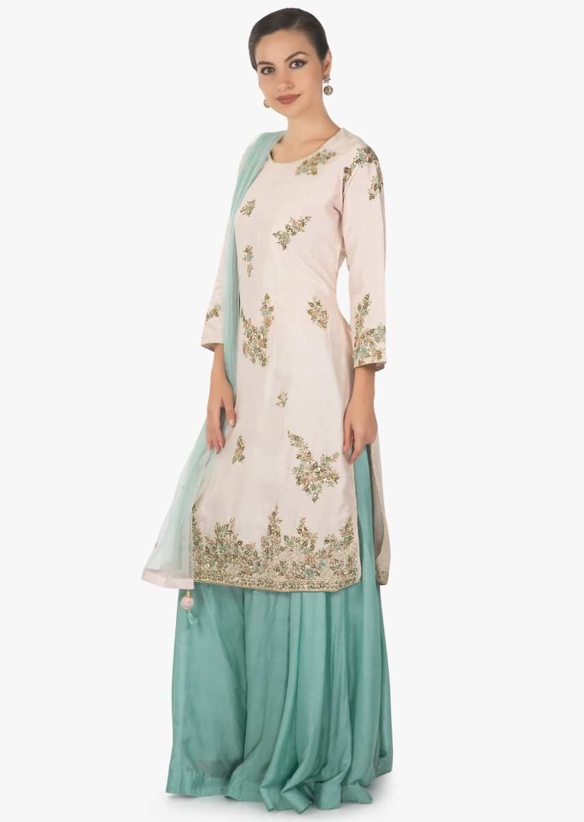 Powder pink straight suit in silk with embroidered butti and hem