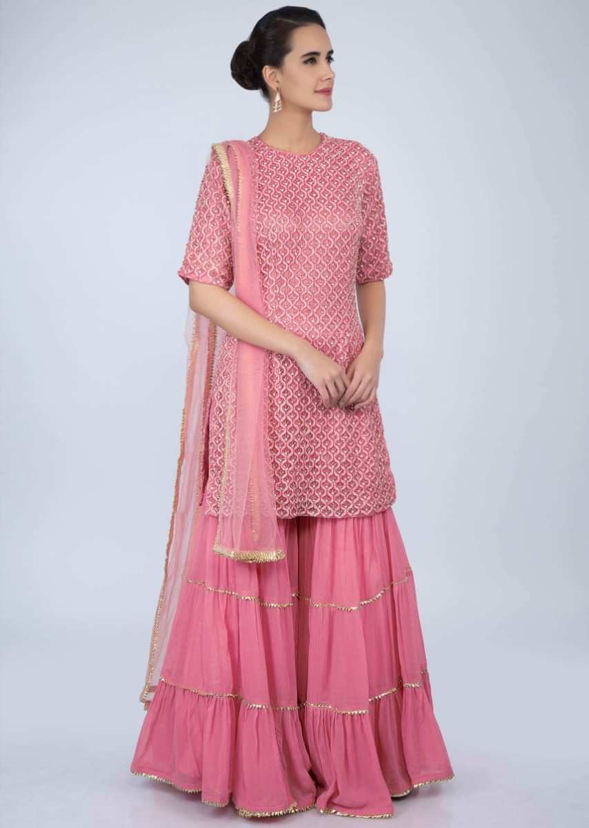 Punch pink heavy embroidered sharara suit set with cut dana and sequins work only on Kalki