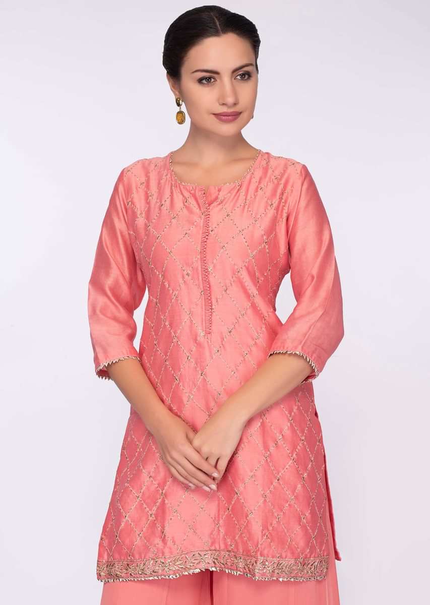 Punch pink jaal embroidered suit with georgette sharara and chiffon dupatta