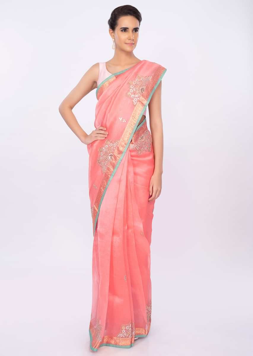 Punch pink organza saree with butti and border only on kalki