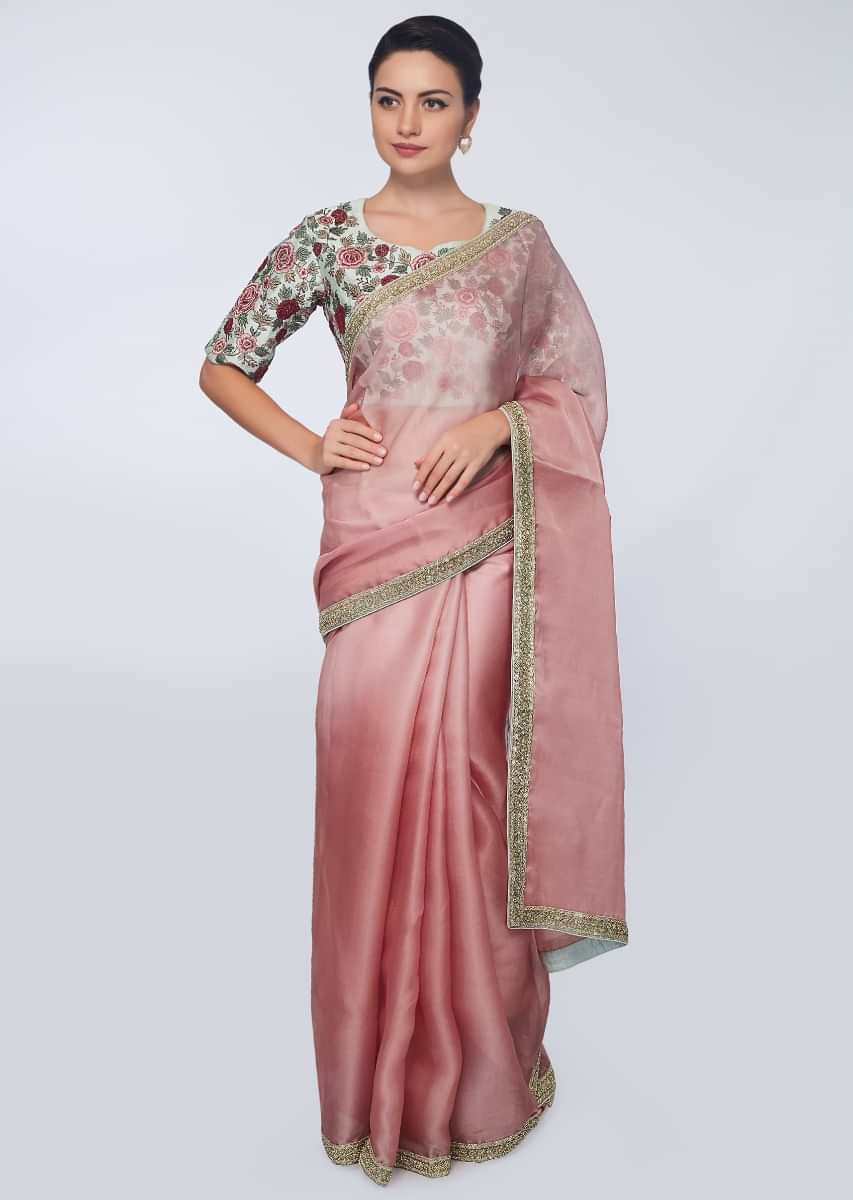 Punch pink organza saree with heavy embroidered border 