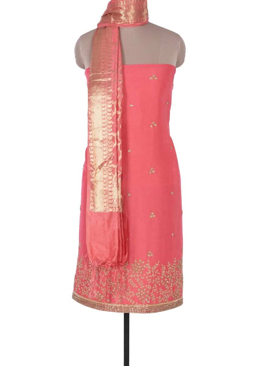 Punch pink santoon suit with cut dana and moti embroidery and butti