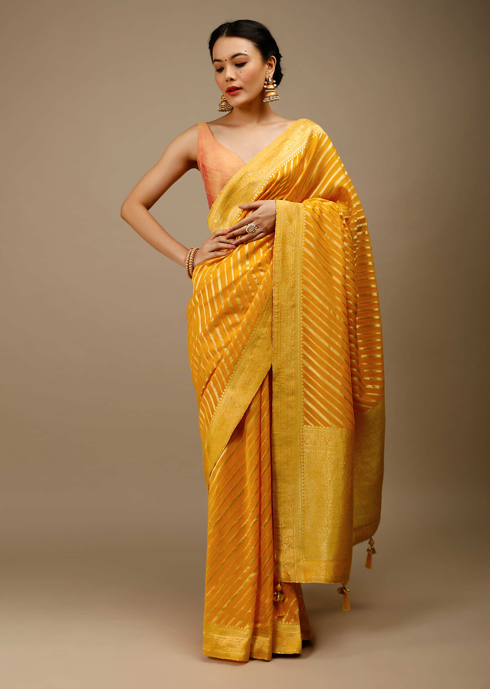 Radiant Yellow Saree In Georgette With Brocade Woven Diagonal Stripes And Floral Border  