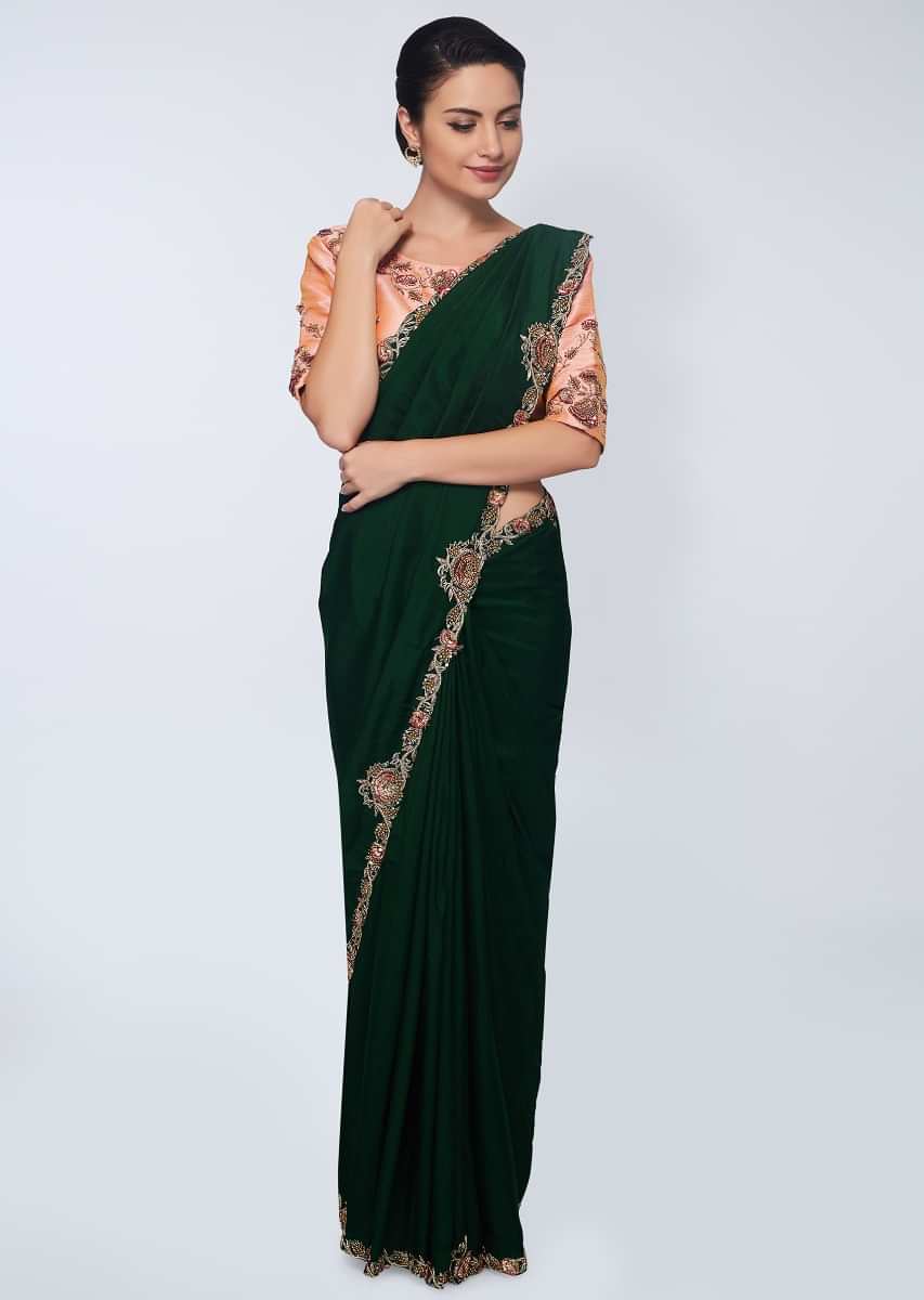 Rama green silk saree with floral embroidered  butti and border 