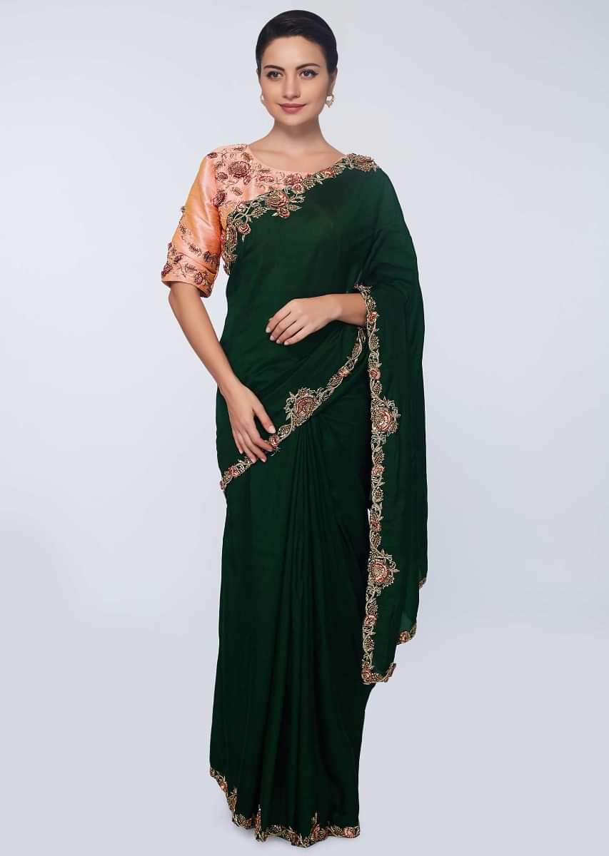 Rama green silk saree with floral embroidered  butti and border 