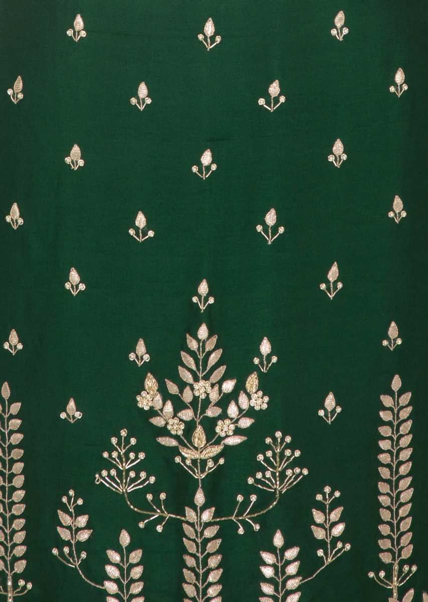  Rama green silk unstitched suit enhanced with gotta patch and moti work 